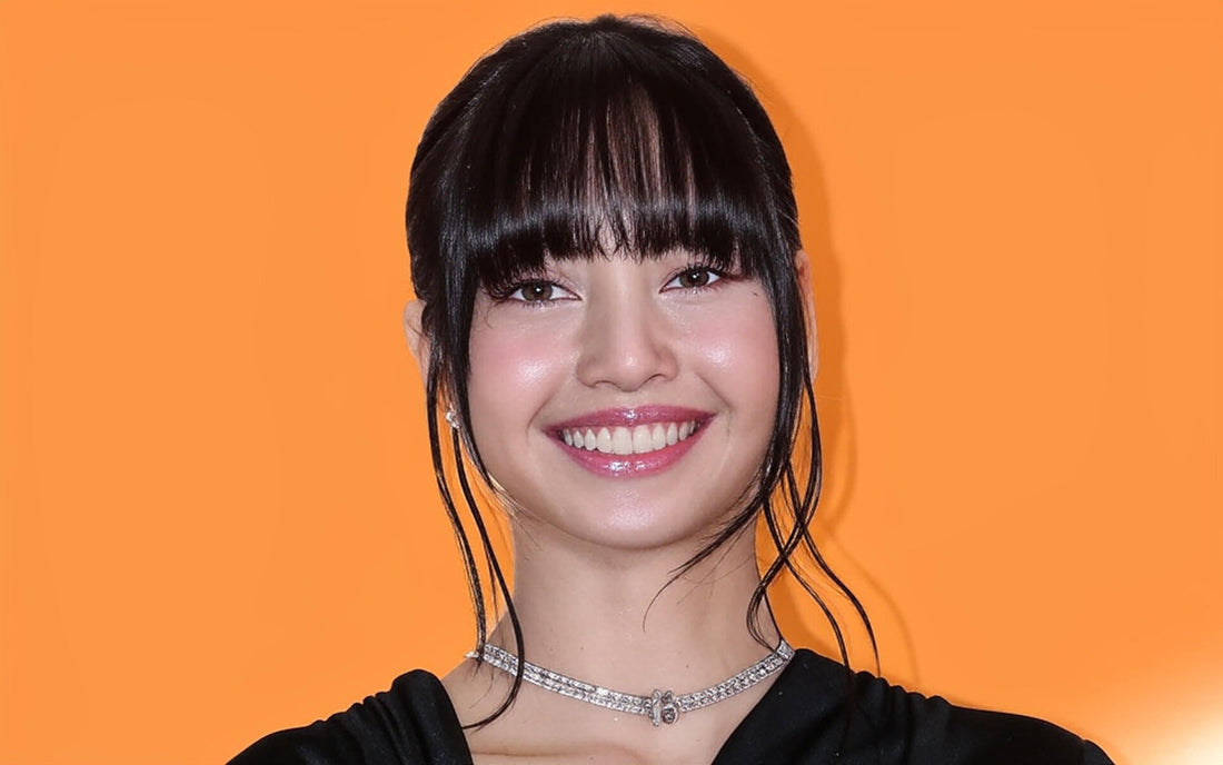 Lisa wearing colorful outfit at Louis Vuitton LVSS26 unveiling at the Louvre Museum